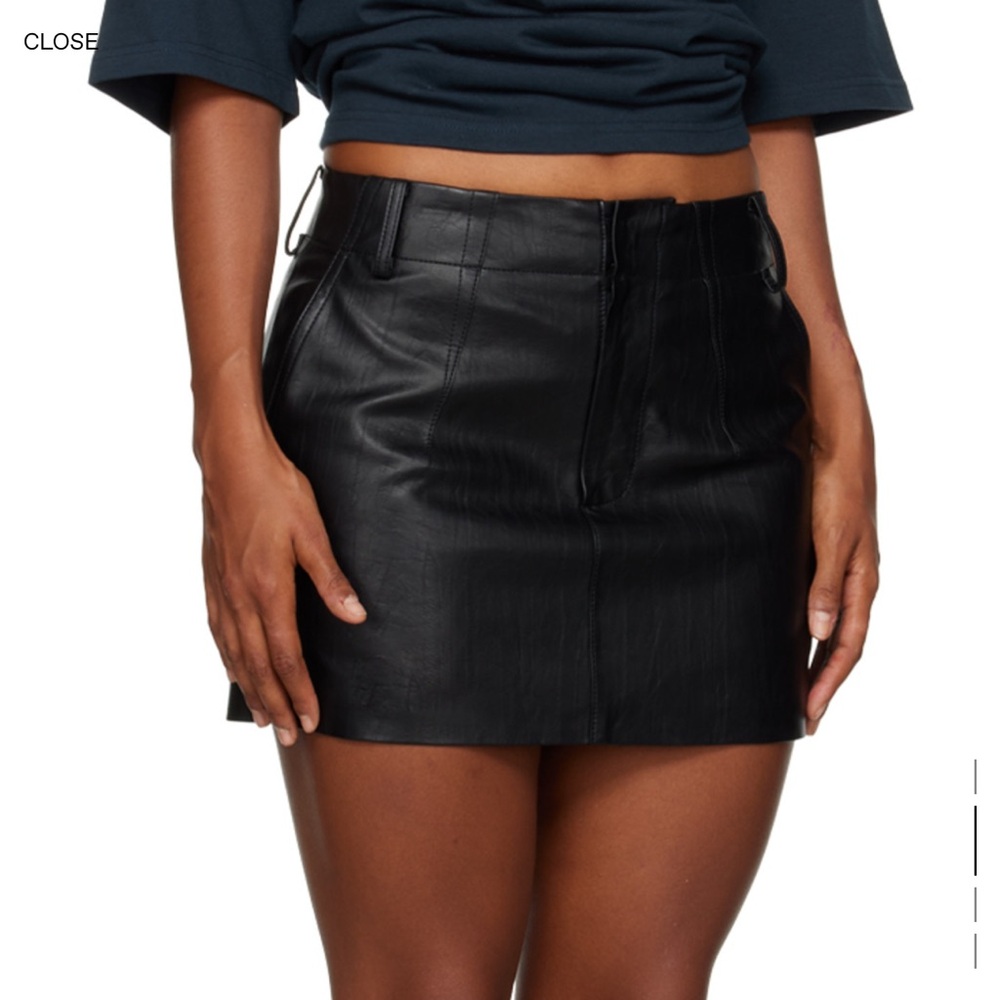Leather mini black skirt.